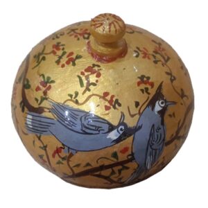 This Paper Machie round powder box can be used to keep anything.